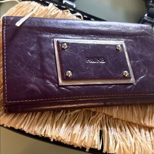 EGGPLANT Purple wallet!  NAME Tag PRUNE flanked by four metal studs. Approx 8”